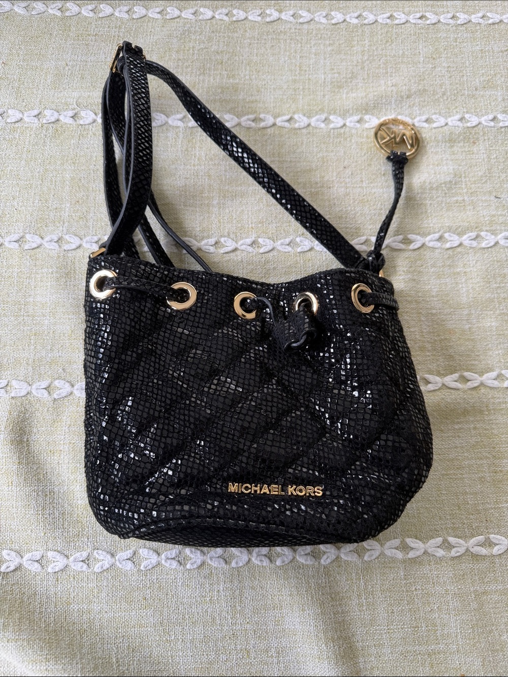 Michael Kors Black Quilted Drawstring Crossbody with Gold Hardware